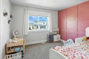 Bedroom with carpet and baseboards