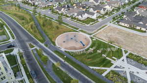 Aerial view of property's location with nearby suburban area