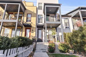 Contemporary house featuring stucco siding