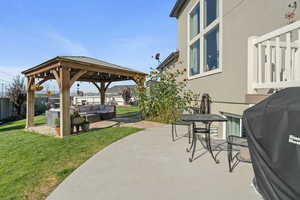 View of patio / terrace with outdoor lounge area, a gazebo, and a grill