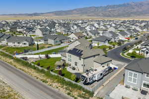 Aerial view of residential area featuring mountains