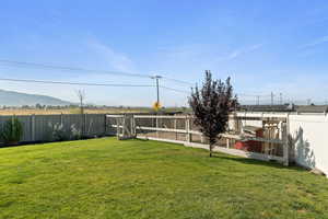View of fenced backyard