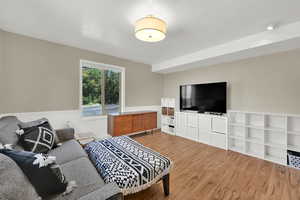 Living area featuring light wood finished floors