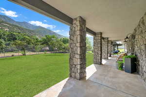 View of patio / terrace featuring a mountain view