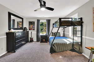 Bedroom featuring carpet flooring and ceiling fan