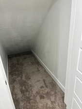 Detailed view of carpet floors and baseboards