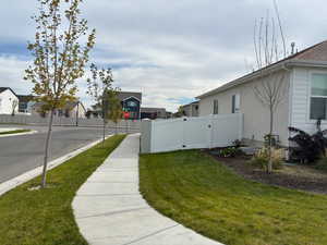 View of yard featuring a gate