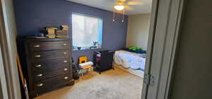 Bedroom featuring carpet flooring and ceiling fan
