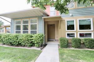 Property entrance with a lawn