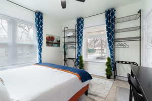 Bedroom featuring baseboards and a ceiling fan