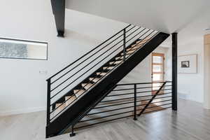 Stairs with wood finished floors
