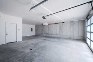 Garage featuring electric panel