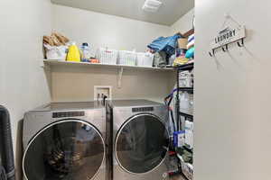 Laundry room featuring washer and dryer