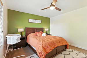 Bedroom with carpet flooring and ceiling fan