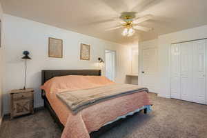 Large primary bedroom with newer carpet