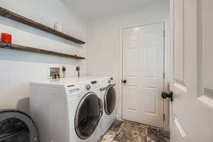Laundry room with  new flooring, washer & dryer included