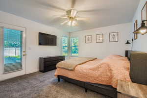 Primary bedroom with deck/patio access