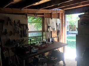 Garage featuring a workshop area