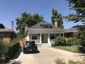 View of front of property featuring EV charger