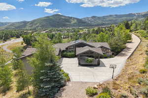 View of subject property with mountains