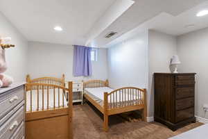 Bedroom featuring carpet floors and recessed lighting