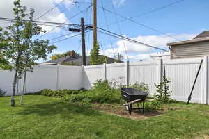 View of fenced backyard