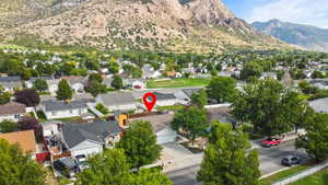 Aerial view of residential area with a mountainous background
