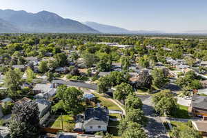 Aerial view of residential area featuring mountains
