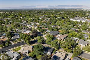 View of property location featuring a mountainous background and nearby suburban area