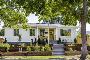 Single story home with brick siding and roof with shingles