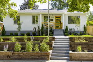 Ranch-style house with brick siding