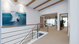 Hall featuring beamed ceiling, carpet flooring, a high ceiling, and an upstairs landing