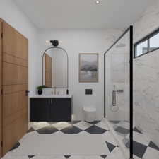 Bathroom featuring a marble finish shower and vanity