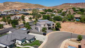 Aerial perspective of suburban area featuring mountains
