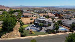 Aerial perspective of suburban area featuring mountains