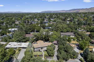 View of property location with a mountainous background and nearby suburban area
