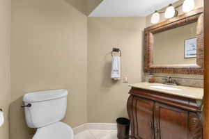 Bathroom with vanity and tile patterned floors