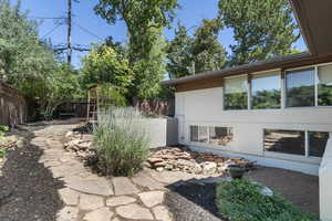View of fenced backyard