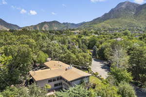 View of subject property featuring a mountain backdrop