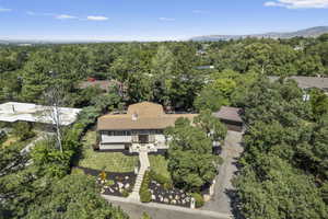 Aerial overview of property's location with a forest