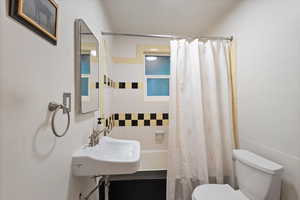 Bathroom with toilet and a sink