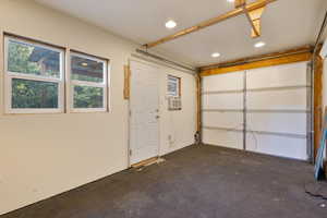 Garage featuring recessed lighting
