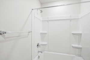 Bathroom with shower / tub combination