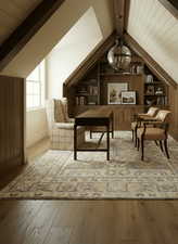 Sitting room featuring light wood-style flooring, built in shelves, and a wooden ceiling with exposed beams