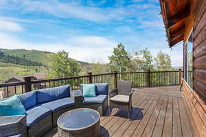 Wooden terrace with an outdoor hangout area