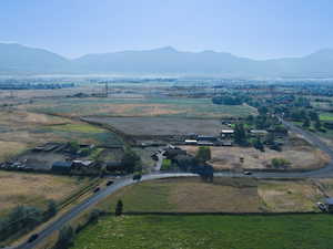 Overview of rural landscape featuring a mountain backdrop