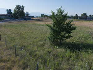 View of yard with a view of countryside