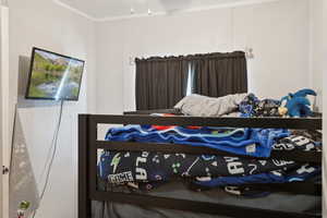 Bedroom with crown molding
