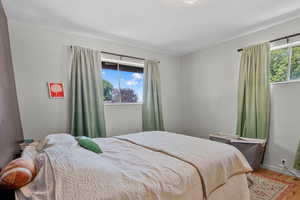 Bedroom featuring wood finished floors
