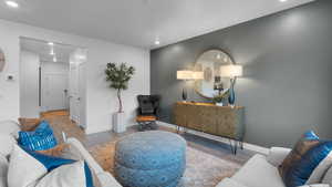 Sitting room featuring wood finished floors and recessed lighting